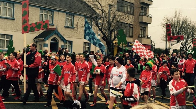 Football team marching in Swords Dublin Parade on St. Patricks Day
